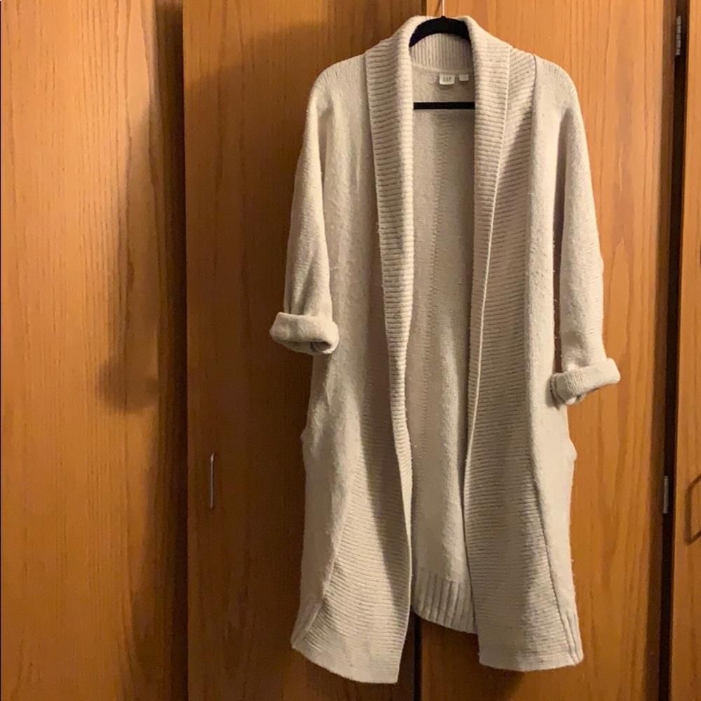 Long cream sweater